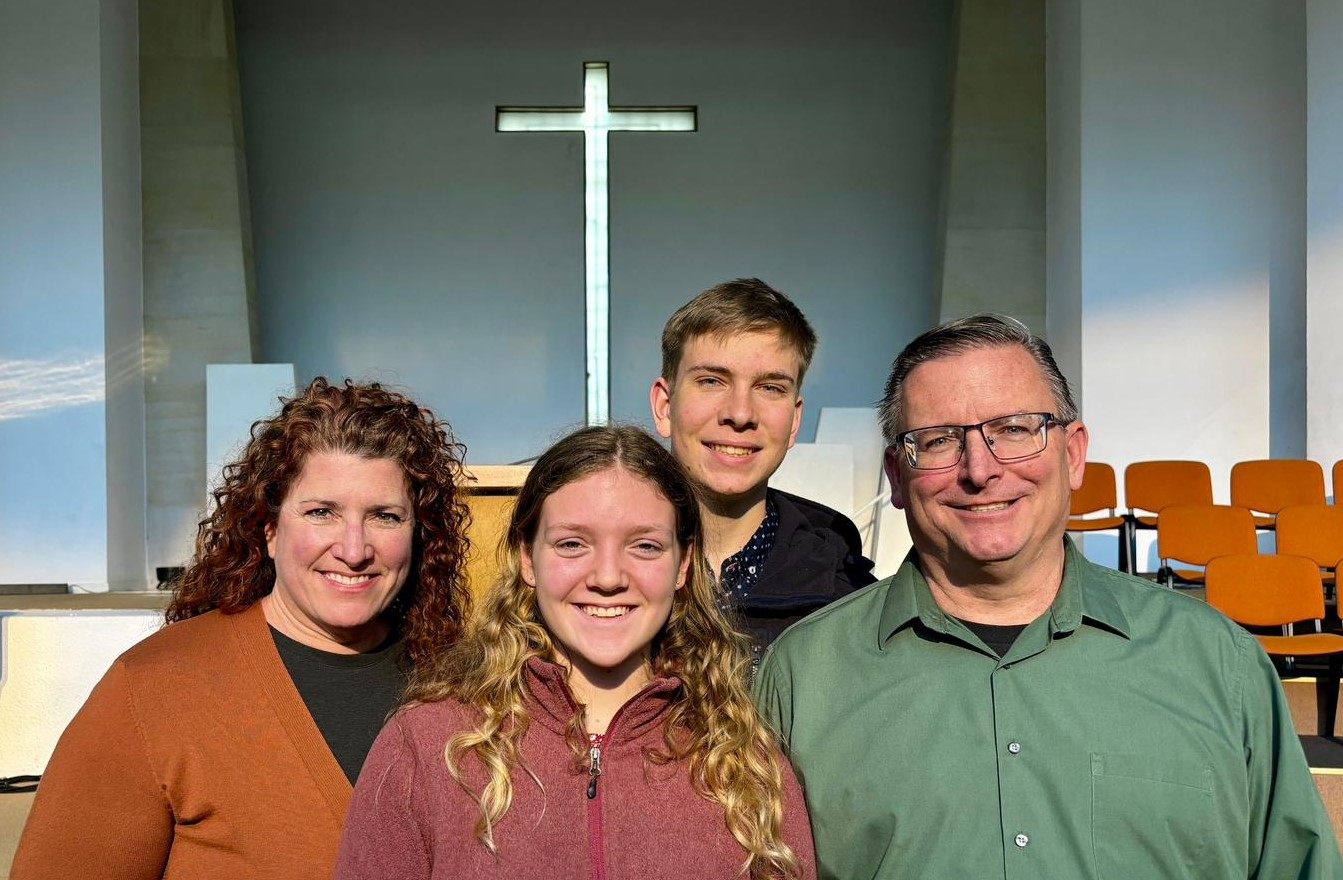 Dennis Cole with his wife Christine and two of their children on a mission trip, 2024