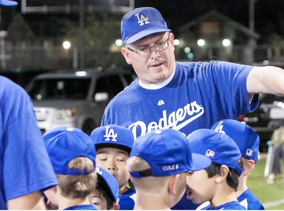 Dennis Cole with a youth baseball team
